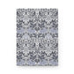 Notebook with a floral and bird pattern on a white background