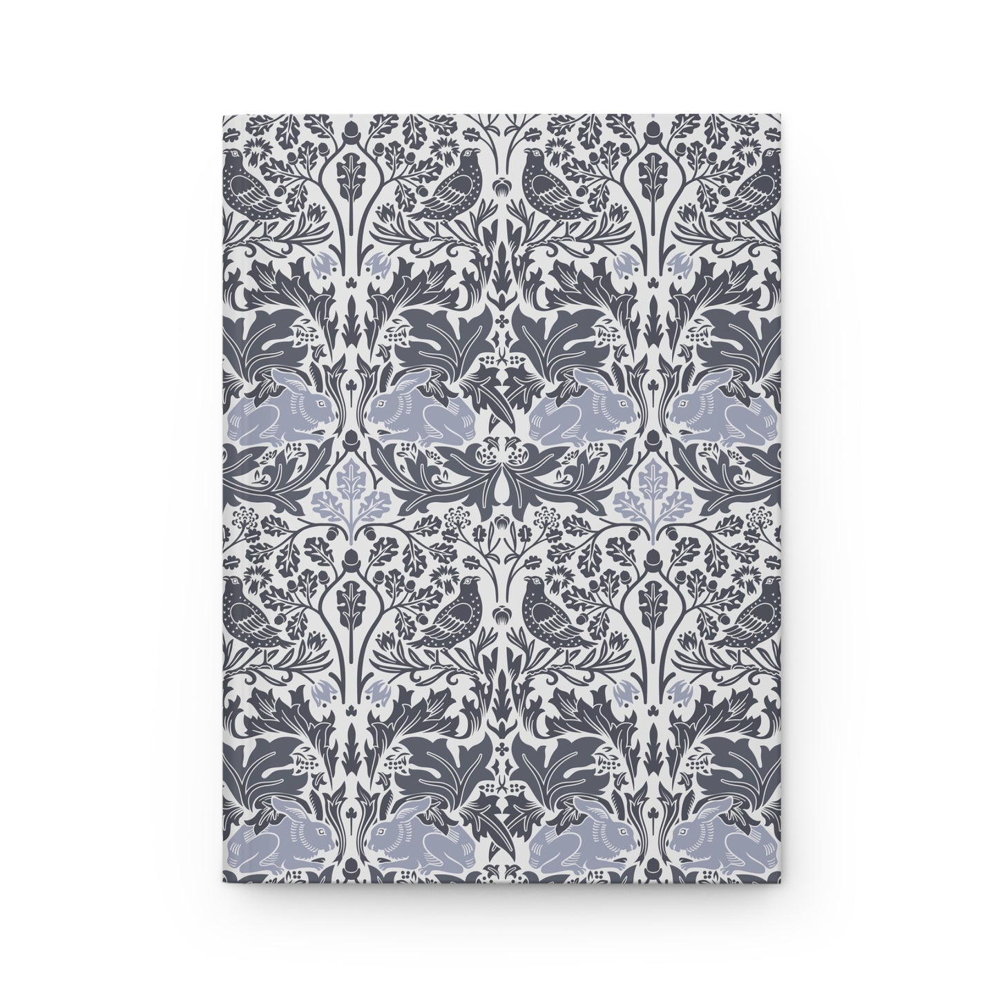 Notebook with a floral and bird pattern on a white background