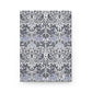 Notebook with a floral and bird pattern on a white background