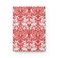 Notebook with red and white floral and bird pattern on a white background