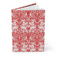 Notebook with red and white floral pattern on a white background