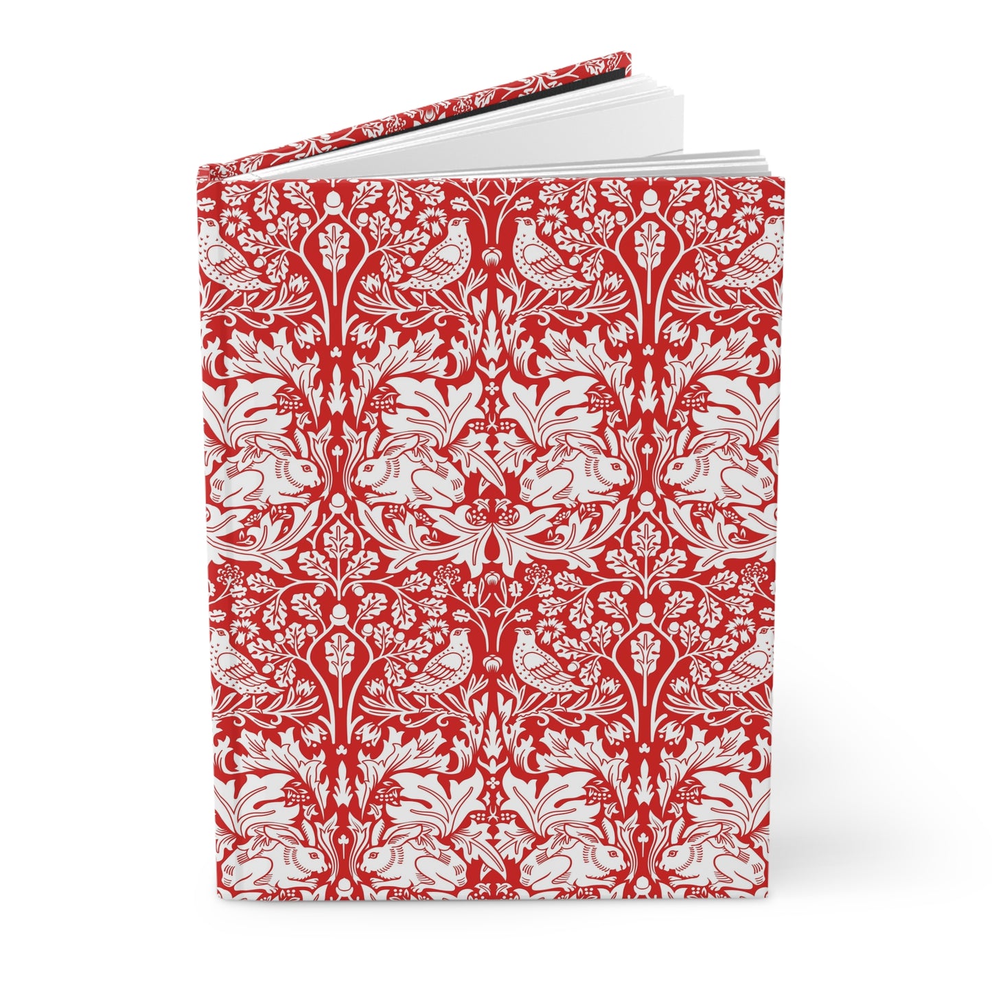 Notebook with red and white floral pattern on a white background