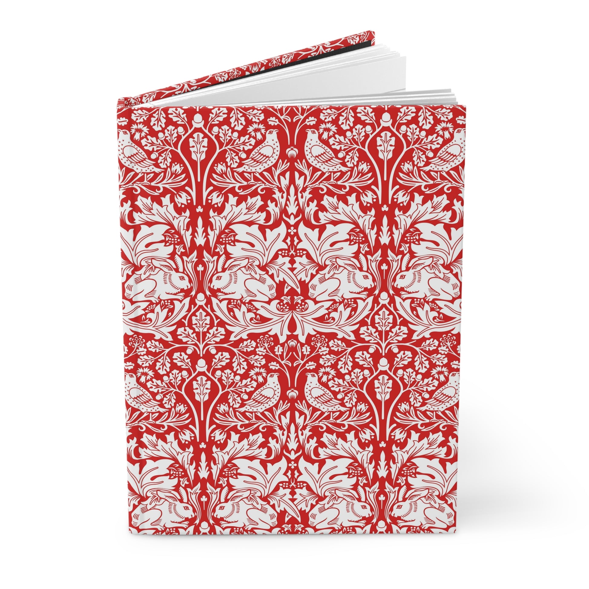 Notebook with red and white floral pattern on a white background