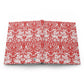 Red and white patterned fabric on a white background