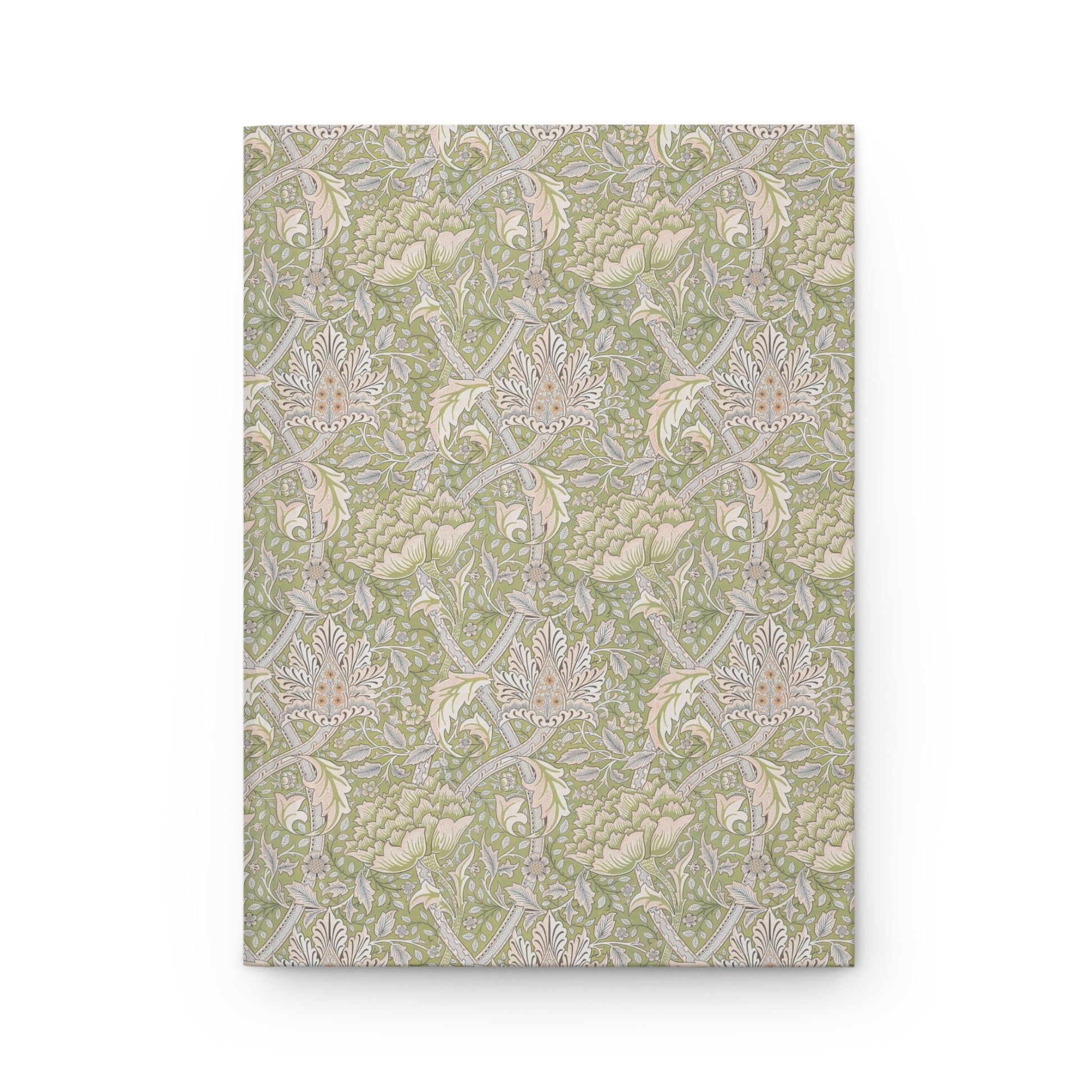 Notebook with a green and beige floral William Morris & Co pattern on a white background