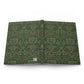 Green patterned notebook on a white background
