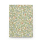 Notebook with a decorative cover featuring William Morris & Co birds and foliage on a white background
