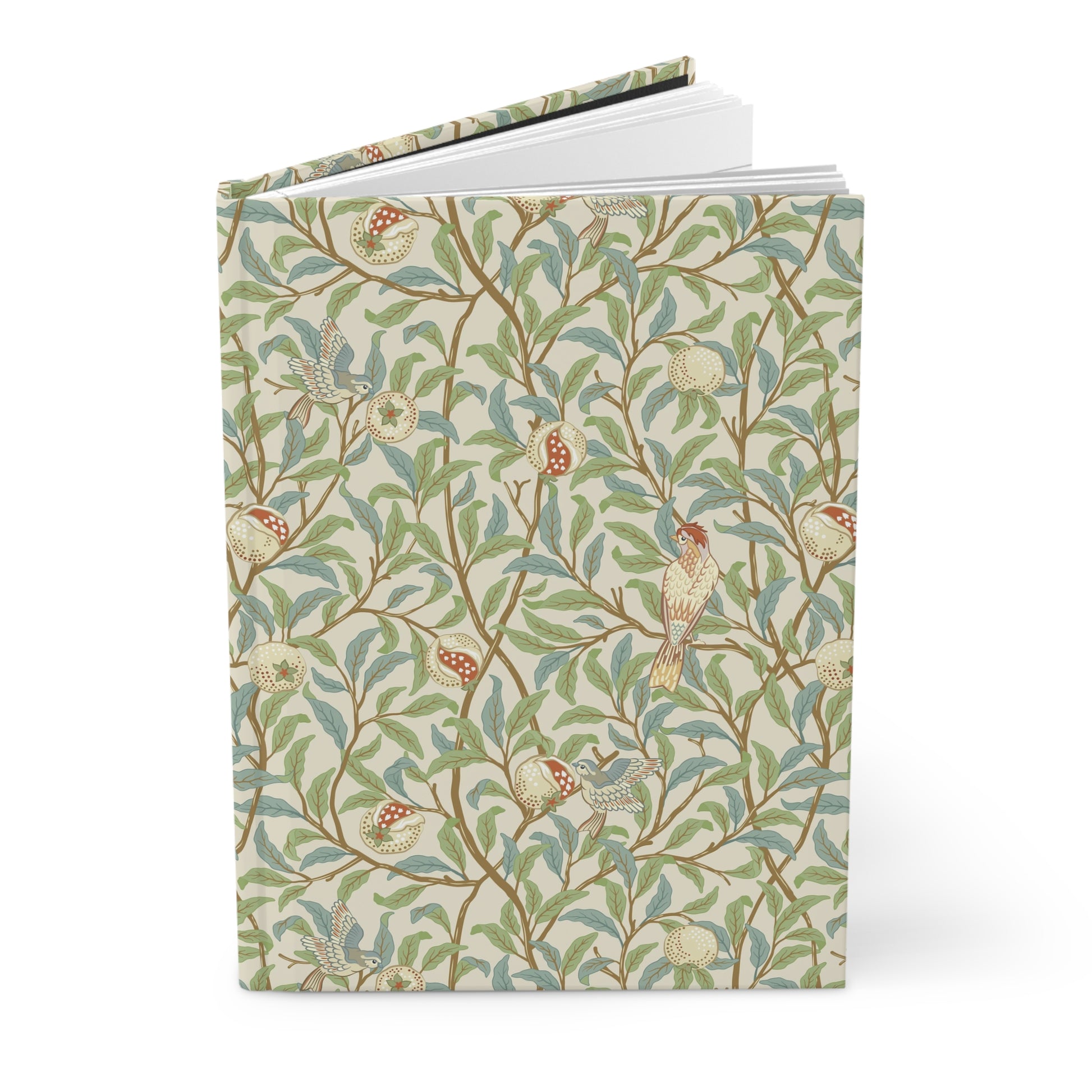 Notebook with a decorative cover featuring William Morris & Co birds and foliage on a white background