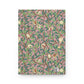 Notebook with a William Morris & Co decorative cover featuring birds and leaves on a pink background