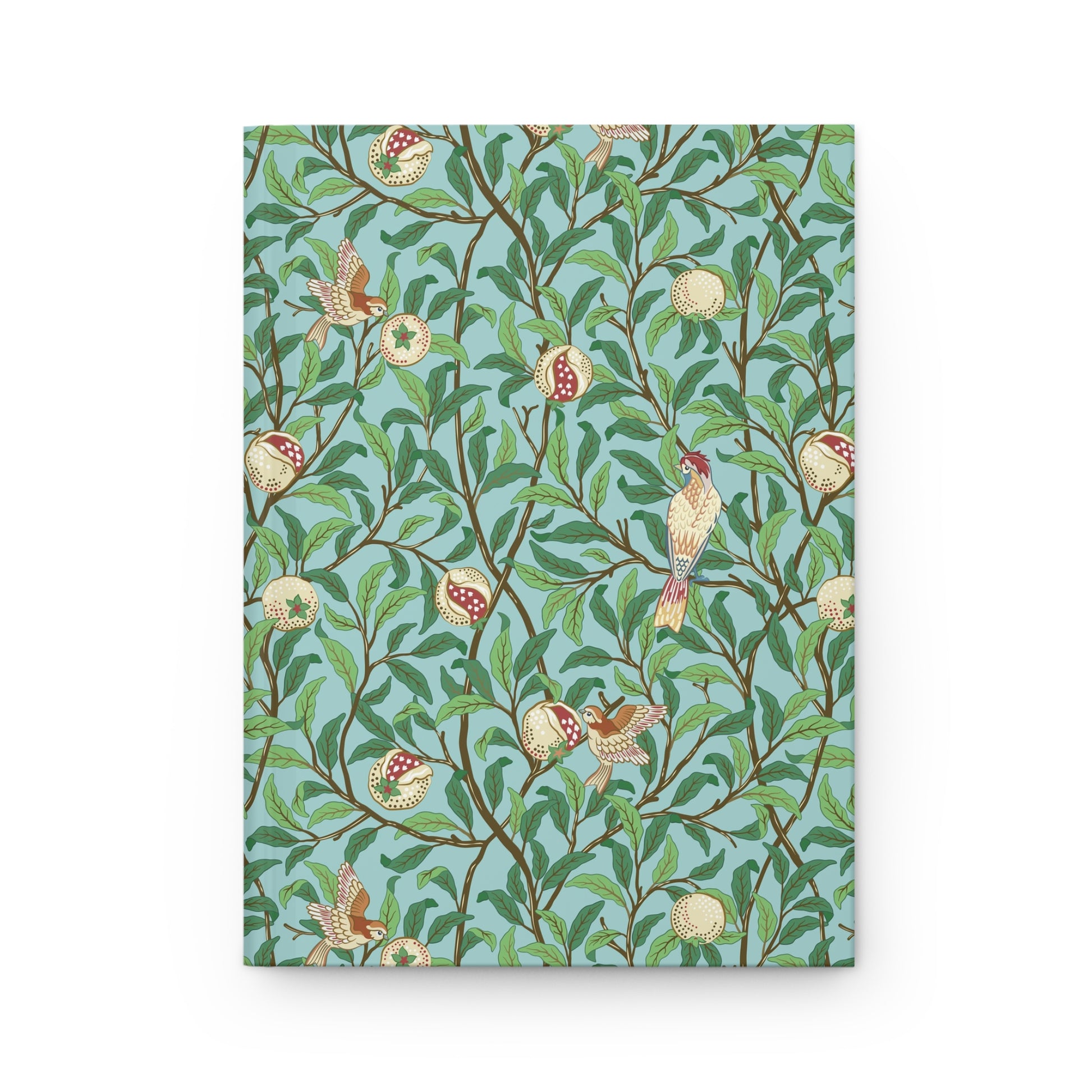 Notebook with bird and floral pattern on a blue background