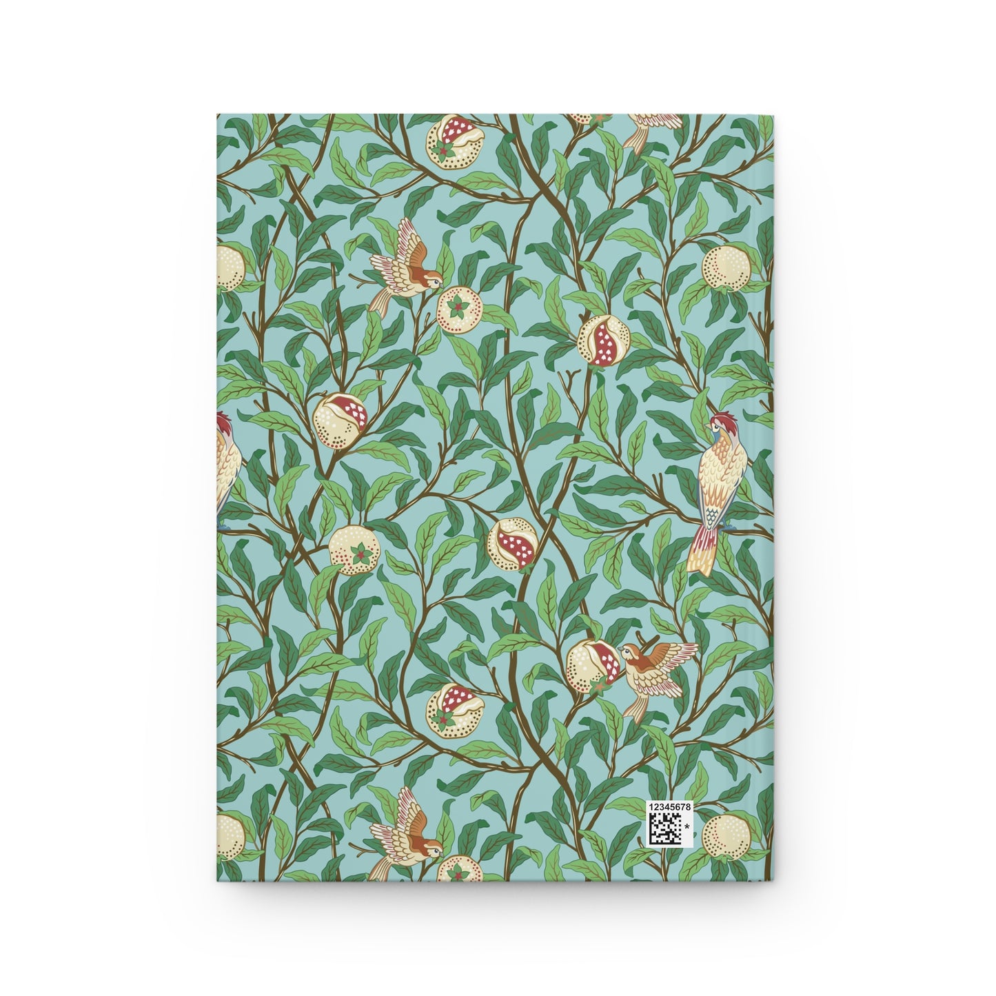 Notebook with a decorative cover featuring birds and branches on a blue background