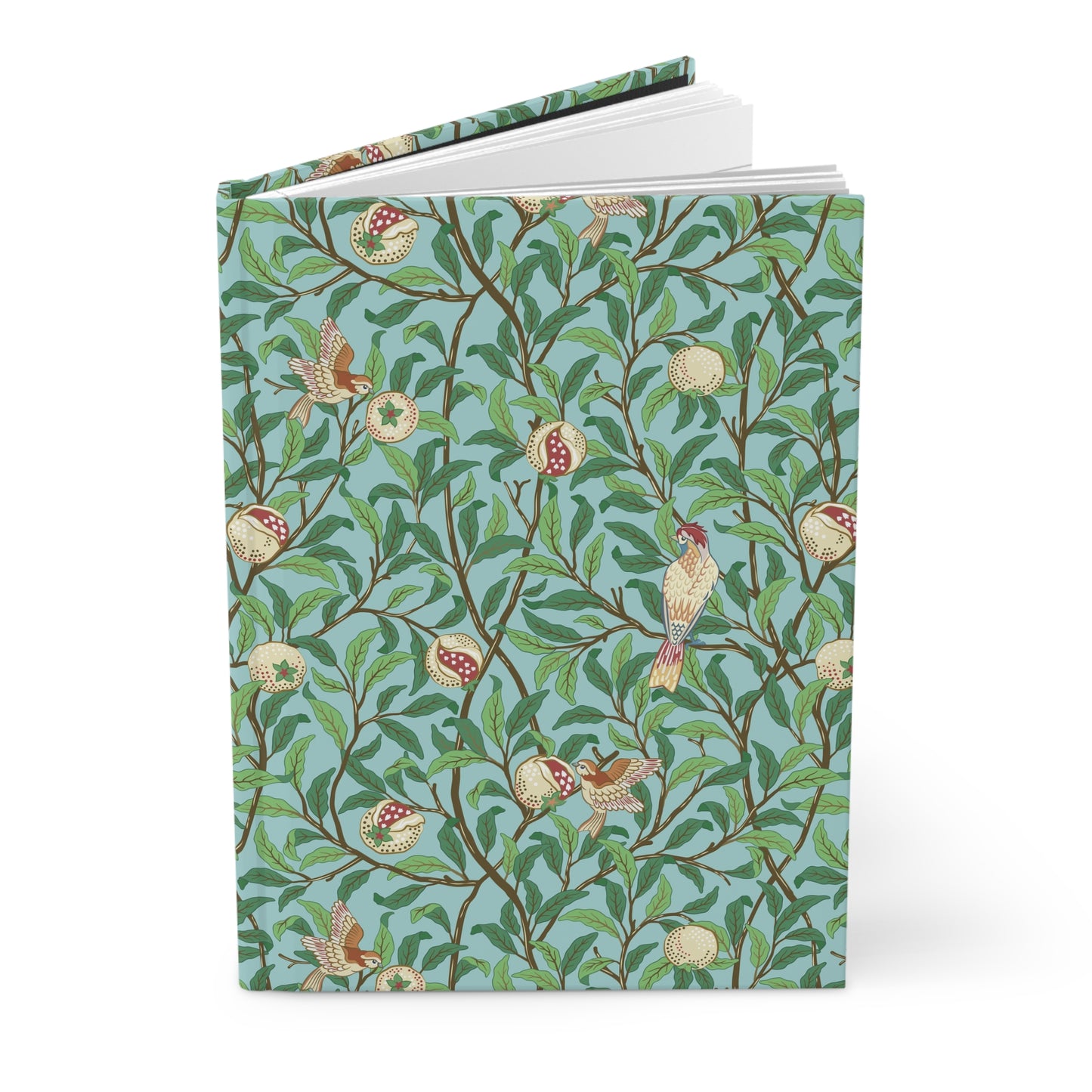 Notebook with a decorative cover featuring birds and branches on a blue background