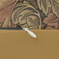 A rectangular lumbar cushion with a William Morris & Co floral pattern in brown, beige, and green colours, featuring a concealed zipper.