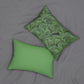 A green lumbar cushion with a floral William Morris & Co pattern, featuring a hidden beige zipper.