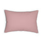 Rectangular lumbar cushion with a floral and bird design inspired by William Morris, in predominantly green and pink colours.