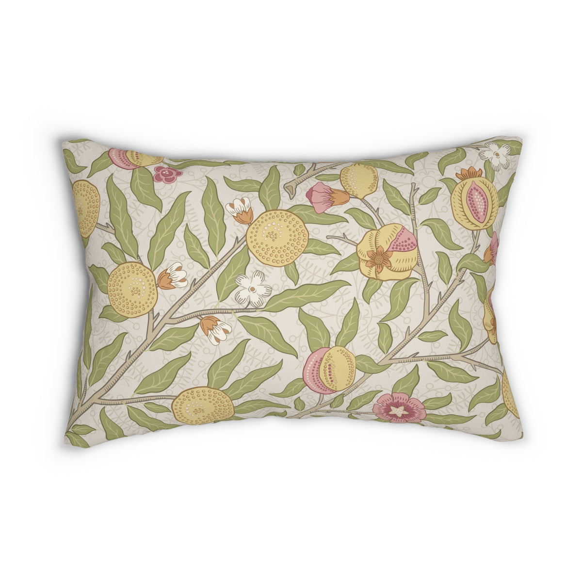 A decorative square throw pillow with a vintage botanical pattern of peaches and green leaves on a cream background, styled on a light gray sofa next to a dark green pillow and a knit blanket.