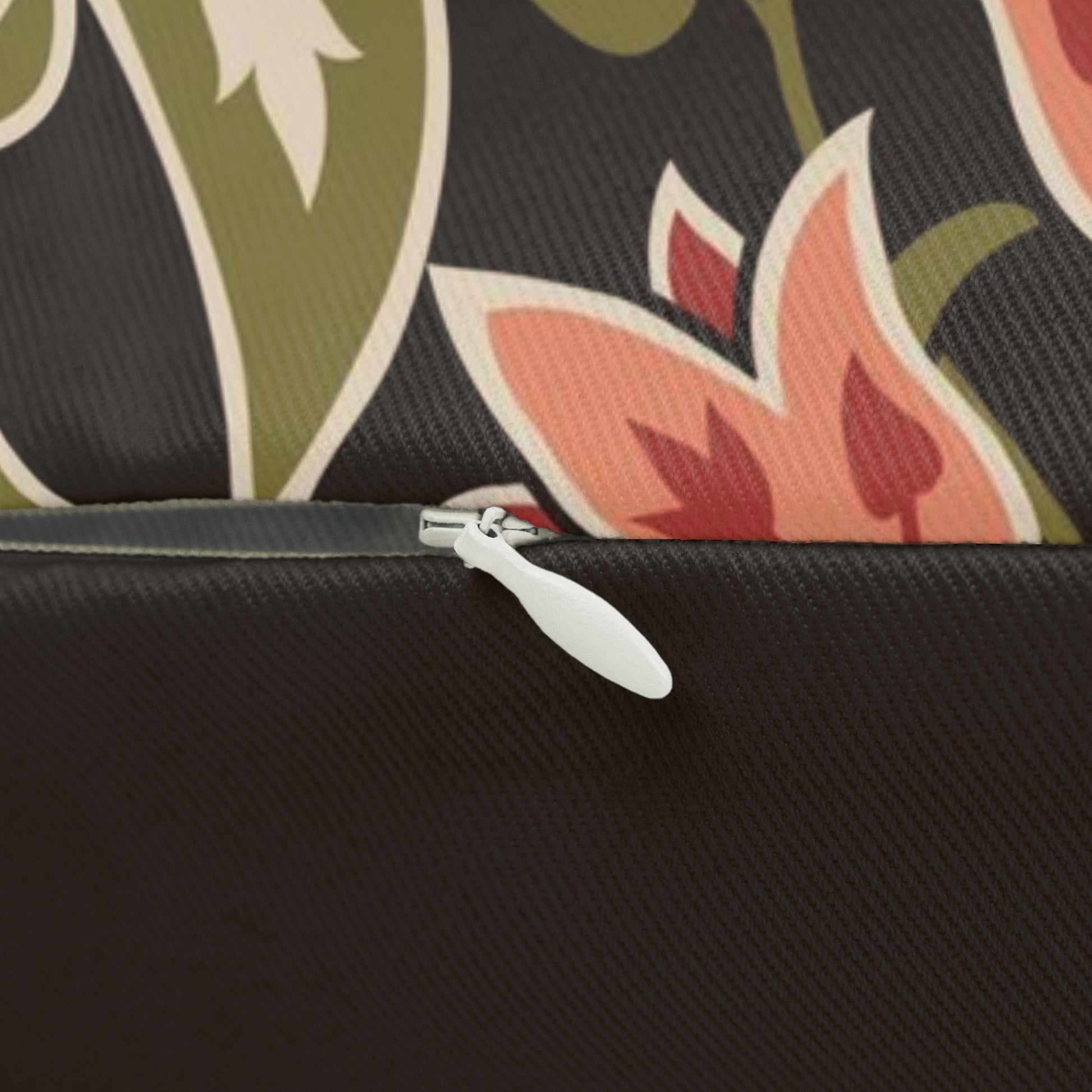 A rectangular lumbar cushion with a William Morris & Co floral pattern featuring various colours such as beige, green, brown, and white.