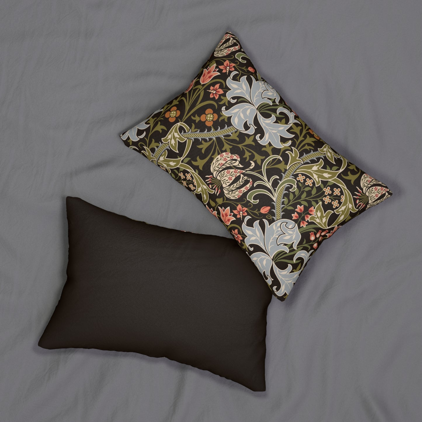 A rectangular lumbar cushion with a William Morris & Co floral pattern featuring various colours such as beige, green, brown, and white.