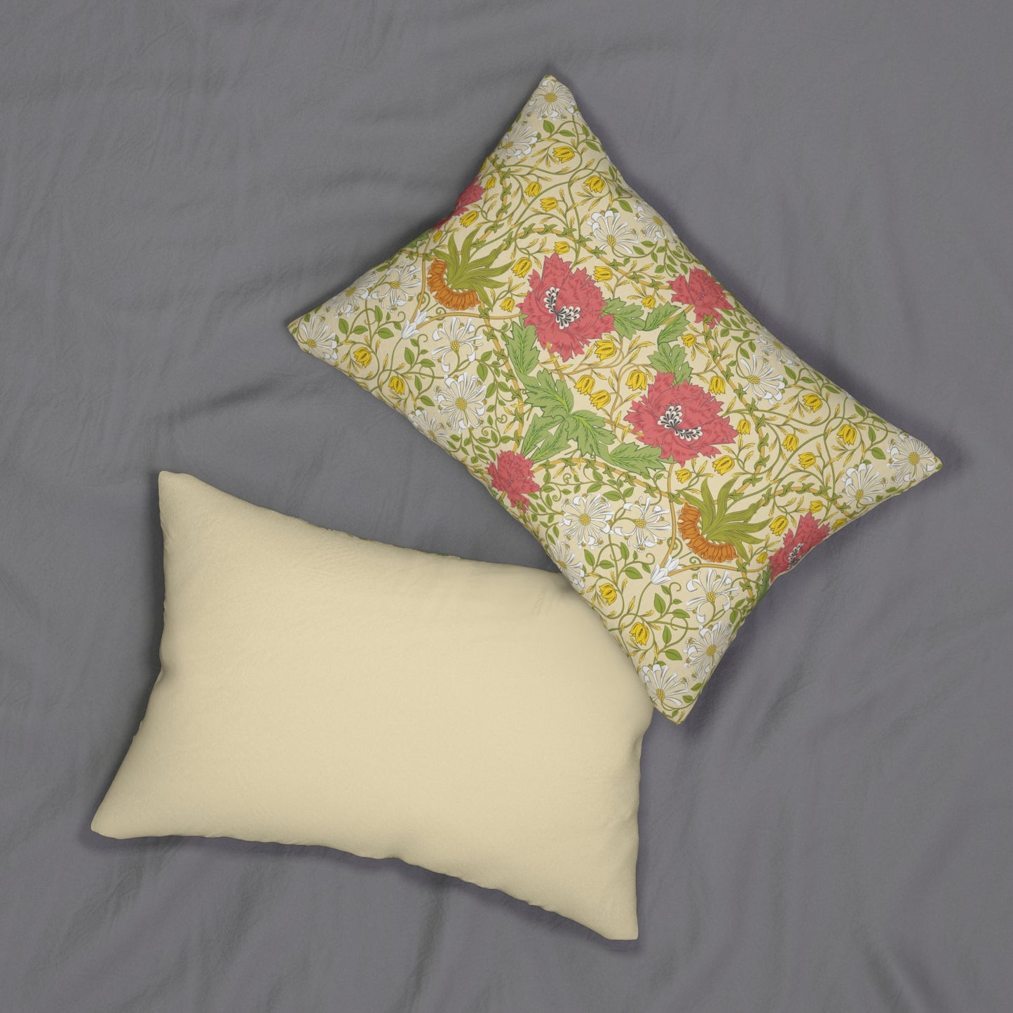 A rectangular lumbar cushion with a floral William Morris & Co pattern featuring honeysuckle designs in shades of pink, green, and yellow, and a concealed beige zipper.