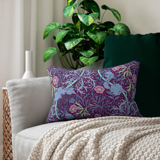 Rectangular lumbar cushion with a William Morris & Co floral pattern in pink, green, and purple colours