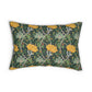 A rectangular decorative throw pillow featuring a William Morris-style floral pattern with large yellow flowers, green foliage, and small orange blossoms on a dark green background, shown against a plain white studio backdrop.