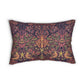 A rectangular decorative throw pillow featuring a detailed, symmetrical botanical and bird pattern in muted pink, olive green, and dark navy blue.