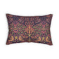 A rectangular decorative throw pillow featuring a dense, symmetrical Art Nouveau pattern with stylised trees, leaves, and birds in coral pink, olive green, and mustard yellow on a dark navy background.