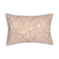 A rectangular decorative throw pillow featuring a classic William Morris-style floral and vine pattern in soft blush pink and cream on a warm beige background, set against a plain white studio backdrop.