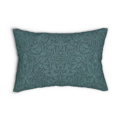 A rectangular lumbar cushion with a William Morris & Co floral pattern in teal colour, featuring acorn and oak leaves.