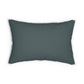 A rectangular lumbar cushion with a William Morris & Co floral pattern in teal colour, featuring acorn and oak leaves.