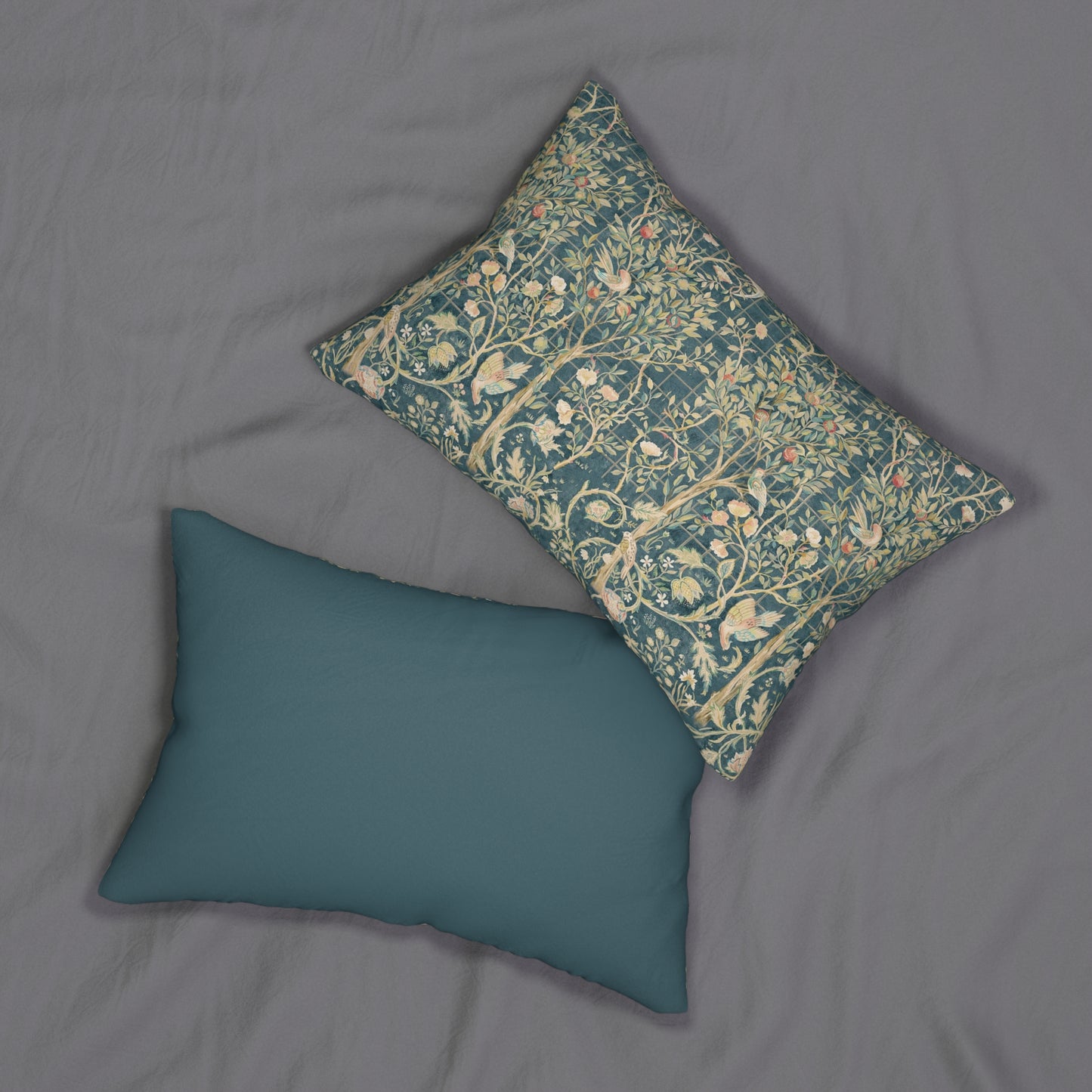 Rectangular lumbar cushion with a floral William Morris & Co pattern in various colours on a teal background.