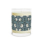 A clear glass candle with a William Morris & Co floral patterned lid and a label that reads 'Seventh Ave White Tea & Fig' alongside a brown cardboard lid.