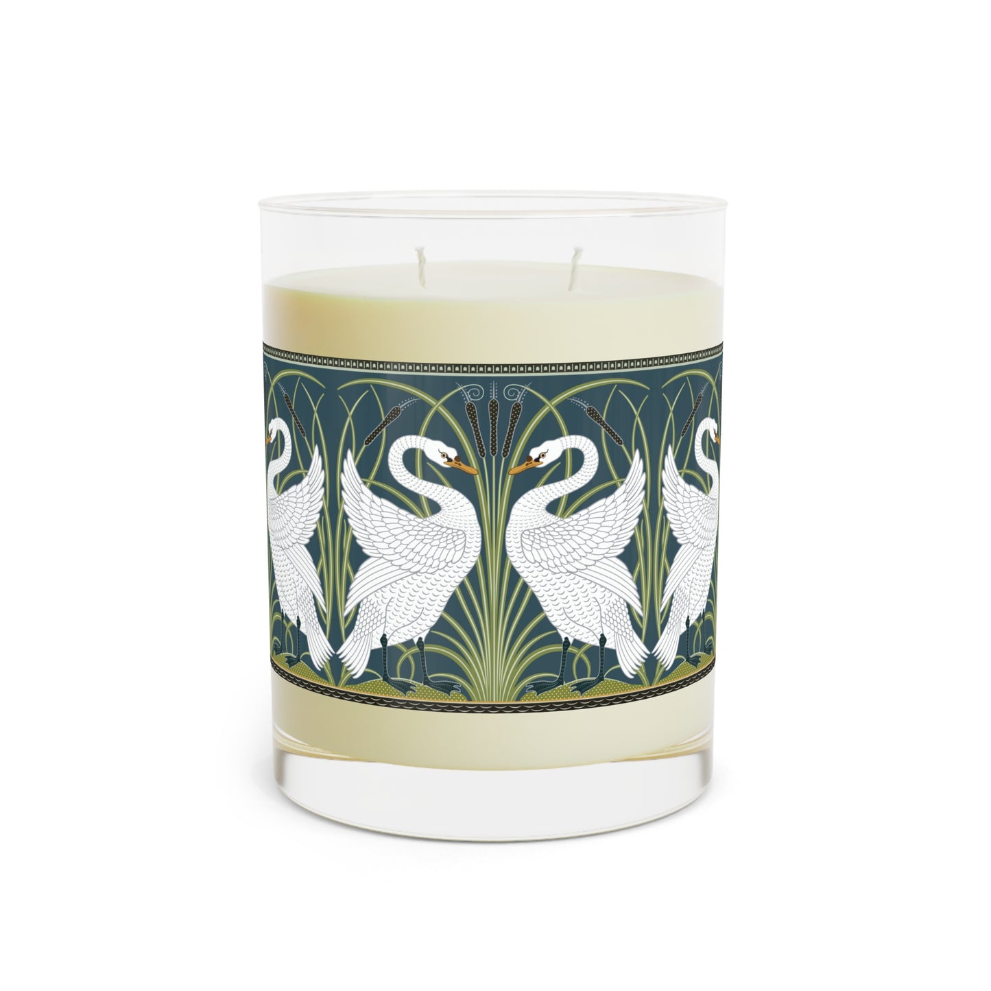 A clear glass candle with a white swan design on the label, alongside a brown cardboard lid with text.