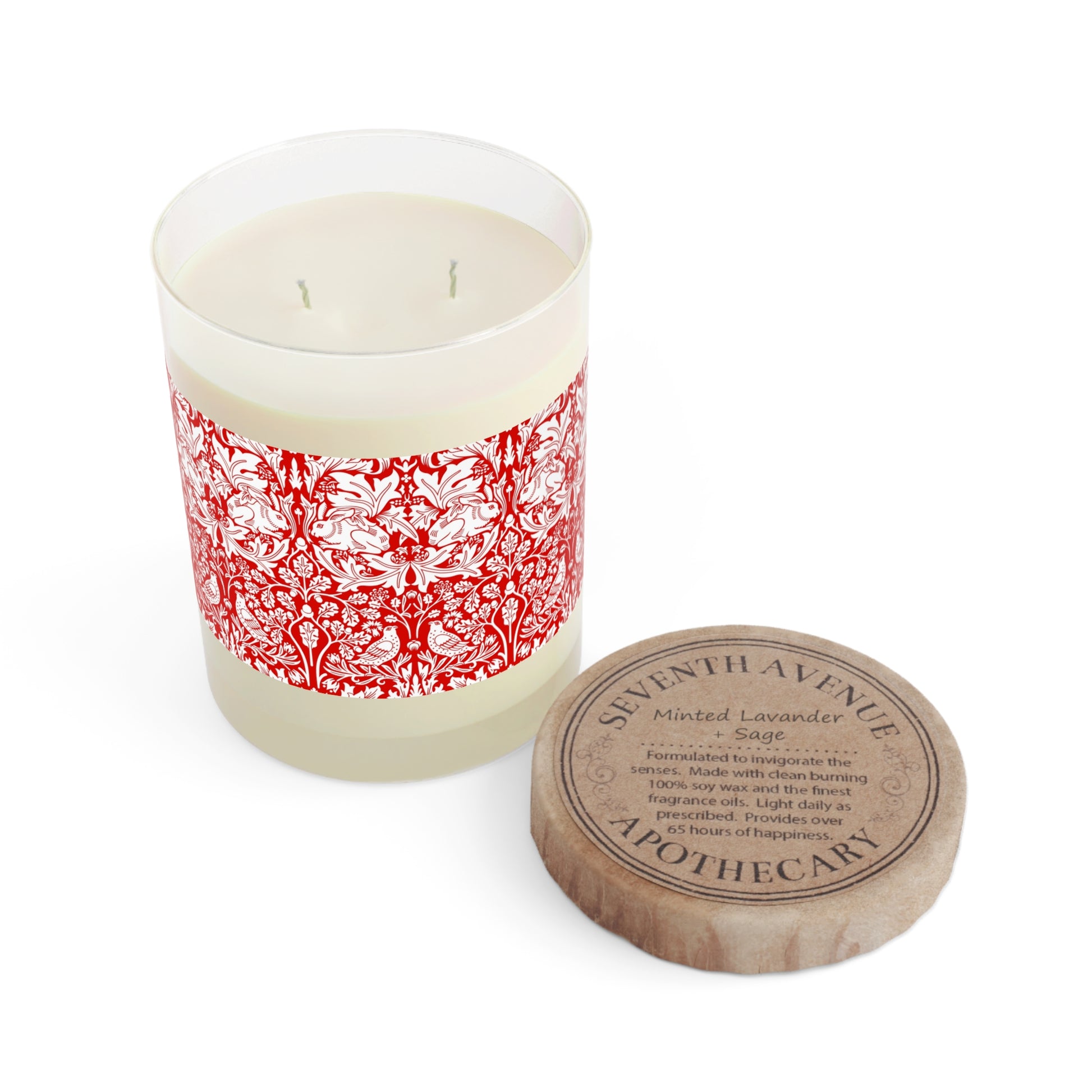 Candle with red floral pattern and wooden lid on a white background