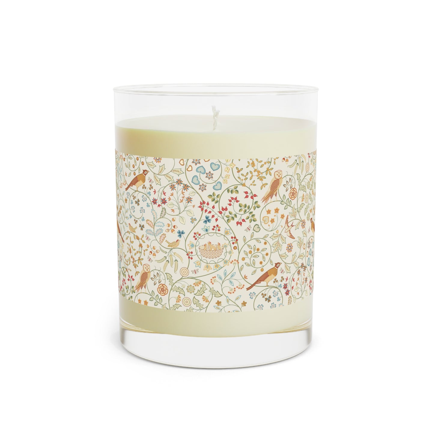 Candle with decorative label on a white background