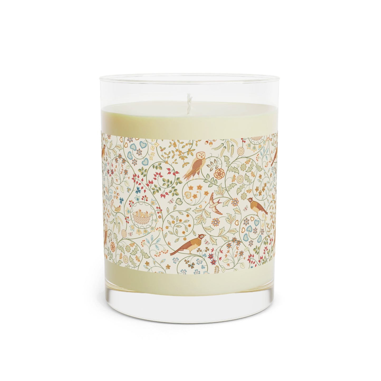 Candle with decorative label on a white background