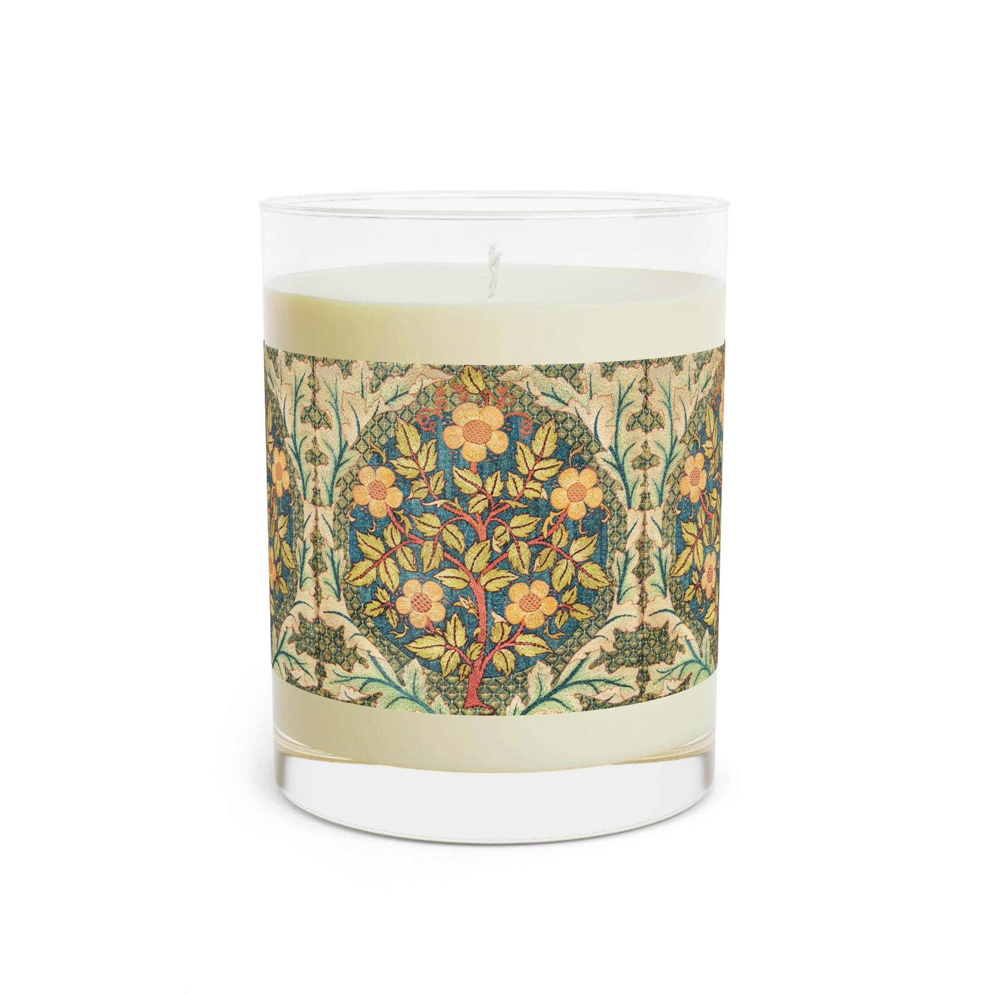 A luxury scented candle with a William Morris & Co floral pattern wrapping around the glass jar, alongside a brown cardboard lid.
