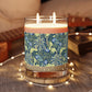 A William Morris & Co luxury scented candle in a glass jar with blue seaweed floral patterns,