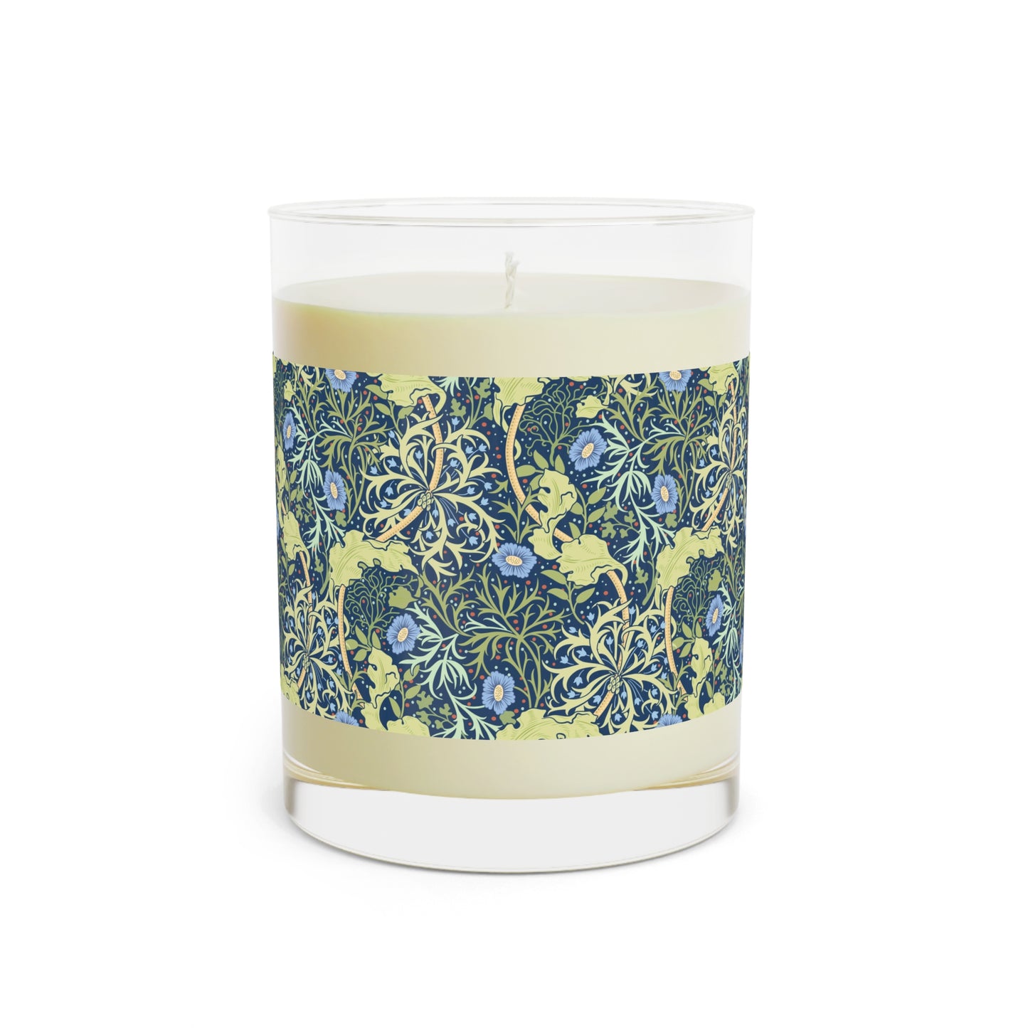 A William Morris & Co luxury scented candle in a glass jar with blue seaweed floral patterns,