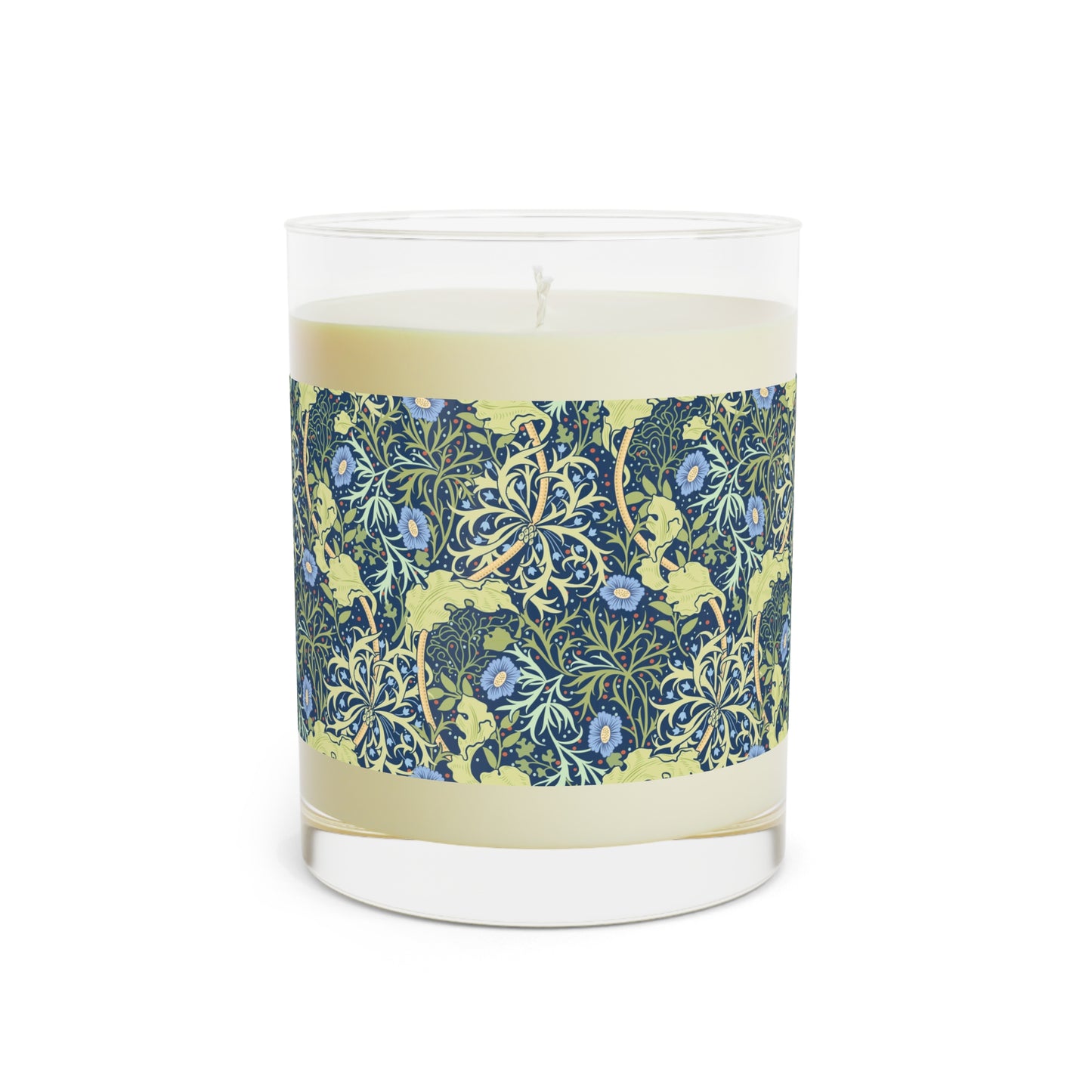 A William Morris & Co luxury scented candle in a glass jar with blue seaweed floral patterns,