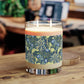 A William Morris & Co luxury scented candle in a glass jar with blue seaweed floral patterns,