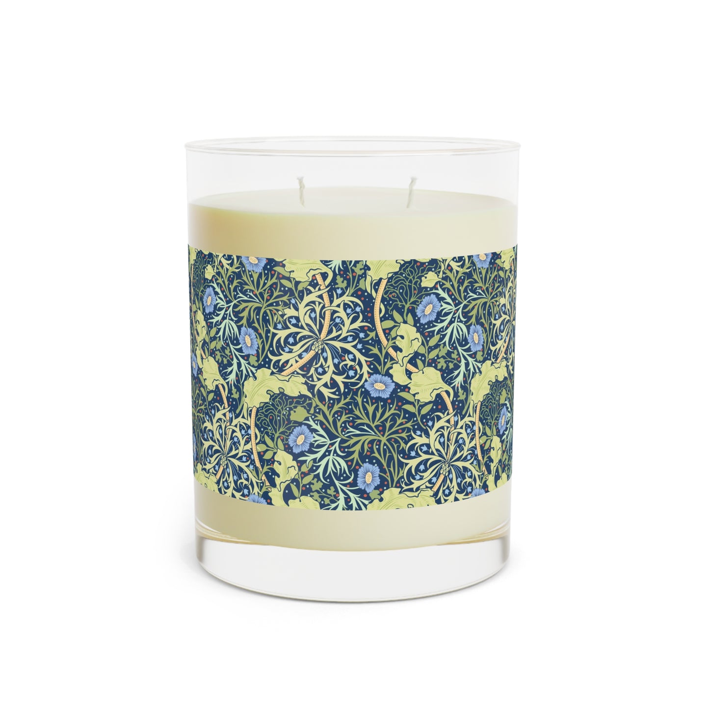 A William Morris & Co luxury scented candle in a glass jar with blue seaweed floral patterns,