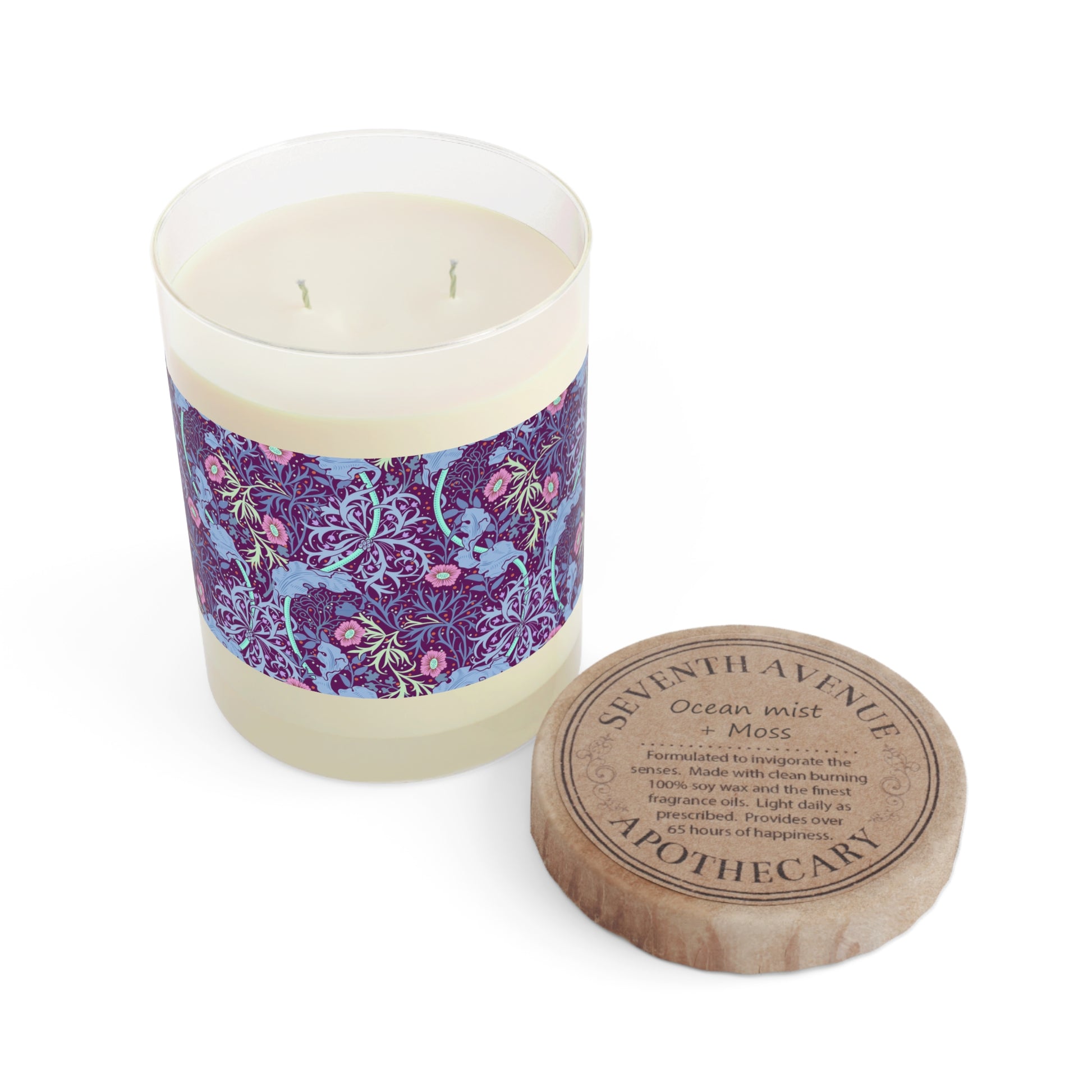 William Morris & Co luxury scented candle in a white jar with a floral pattern, accompanied by a brown cardboard lid.