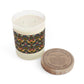 A luxury scented candle with a floral patterned wrap-around print, branded with 'Strawberry Thief Collection (Ebony)' on the jar, alongside a vintage brown cardboard lid.