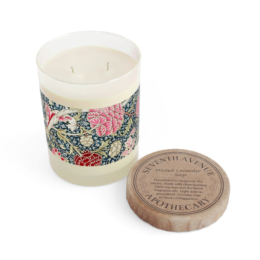 Luxury Scented Candle in a glass jar with a brown paper lid inspired by William Morris  & Co in an Arts & Crafts pattern called Cray with pink and blue flowers