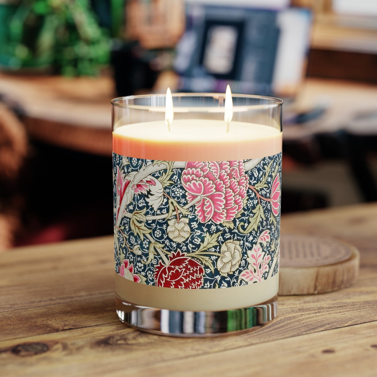 Luxury Scented Candle in a glass jar with a brown paper lid inspired by William Morris  & Co in an Arts & Crafts pattern called Cray with pink and blue flowers