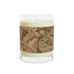 A brown luxury scented candle with a floral William Morris & Co patterned label, alongside a brown cardboard lid with text. The candle is placed in a clear glass jar.