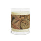 A brown luxury scented candle with a floral William Morris & Co patterned label, alongside a brown cardboard lid with text. The candle is placed in a clear glass jar.