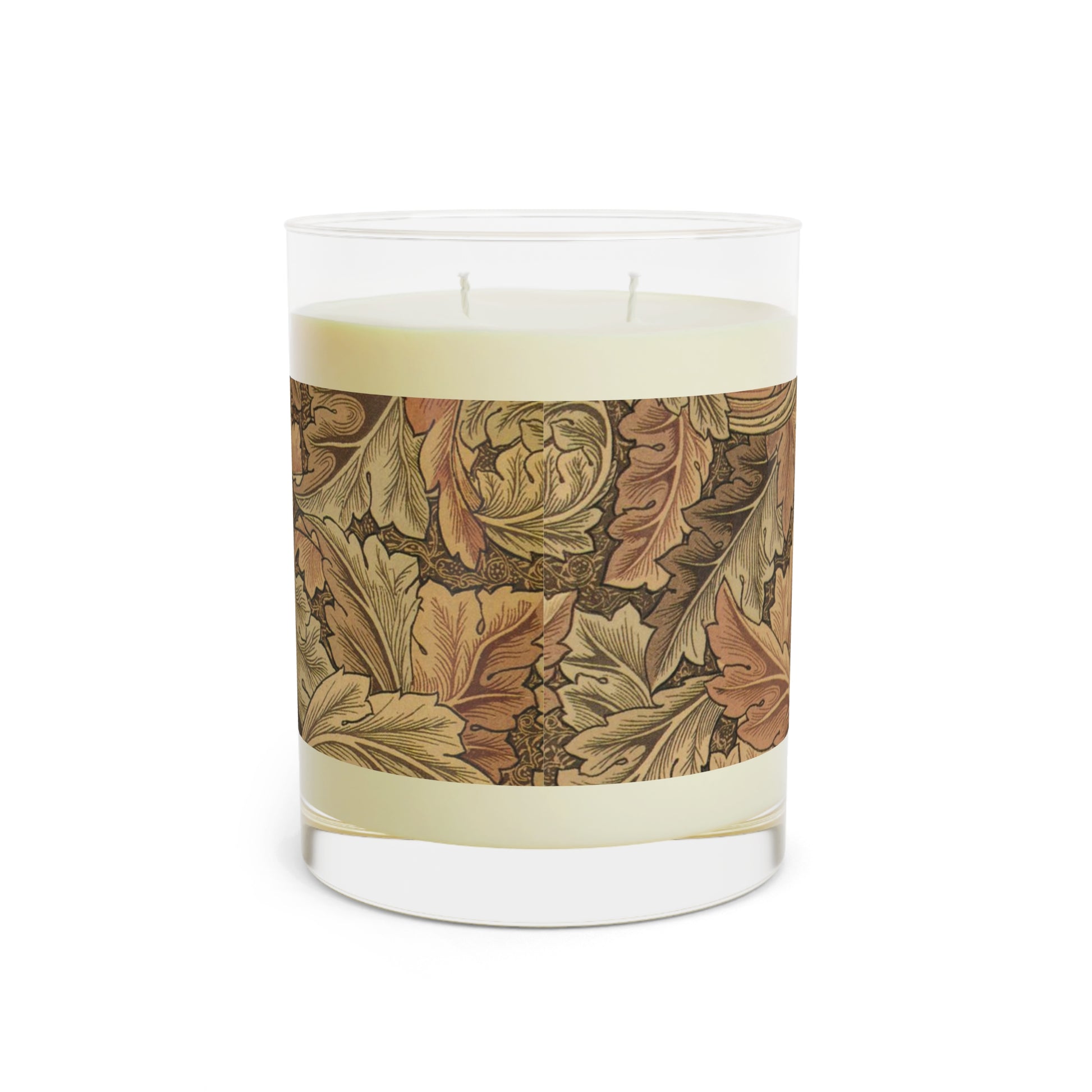 A brown luxury scented candle with a floral William Morris & Co patterned label, alongside a brown cardboard lid with text. The candle is placed in a clear glass jar.