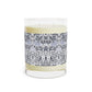 Candle with a decorative label on a white background